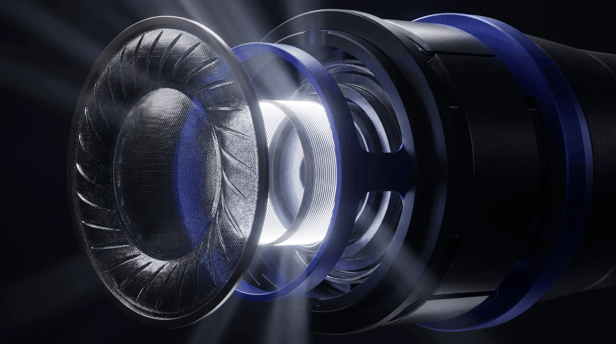 3D exploded view of a dynamic microphone capsule showing the diaphragm, moving coil, magnet structure, and internal acoustic components