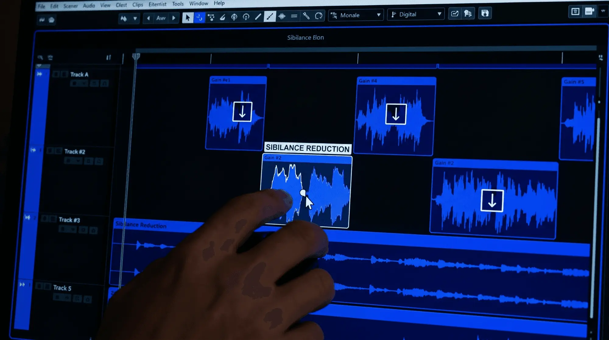 Close-up of a vocal editing session showing waveform clips selected for manual gain reduction to control sibilance before de-essing